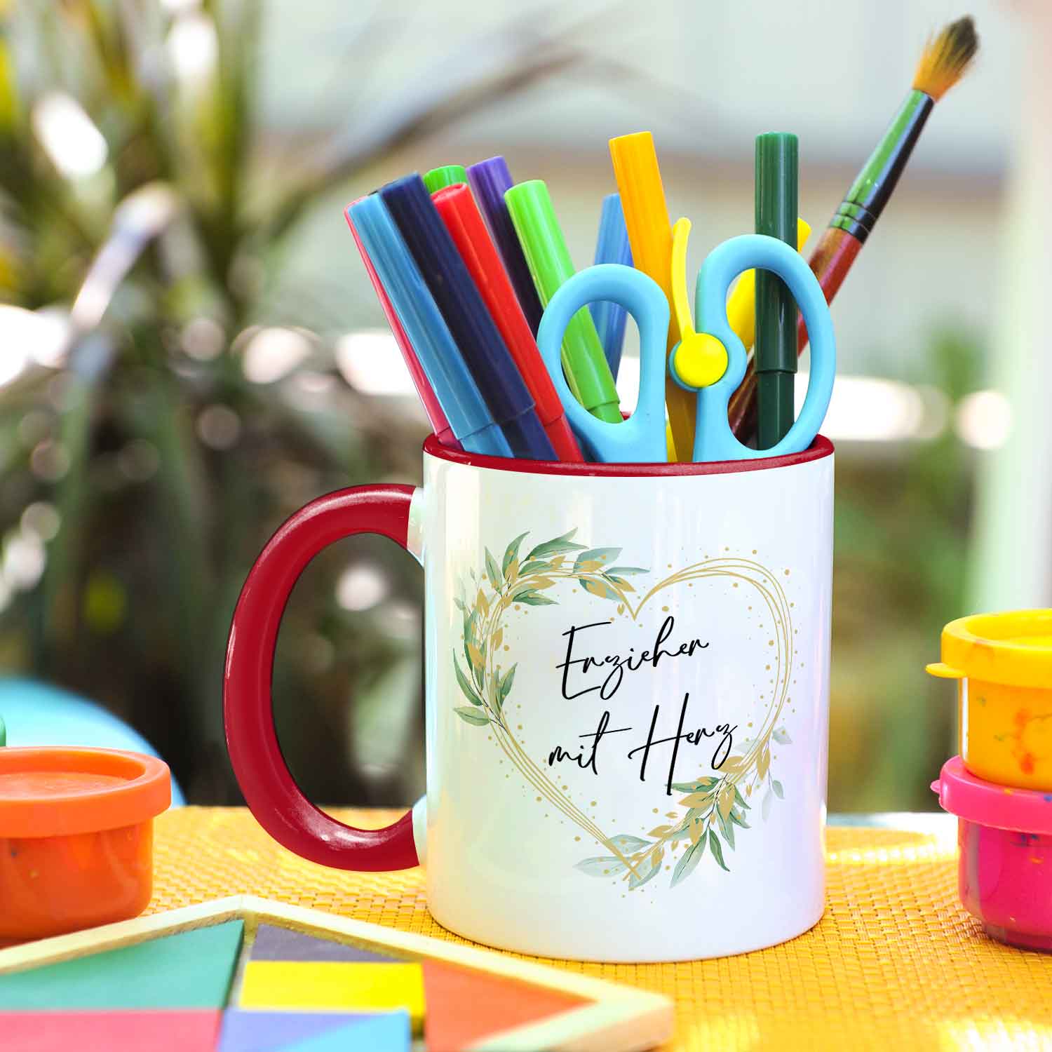Bedruckte Tasse mit Spruch - Erzieher mit Herz