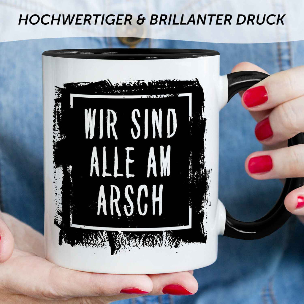 Bedruckte Tasse mit Spruch - "Wir sind alle am Arsch"