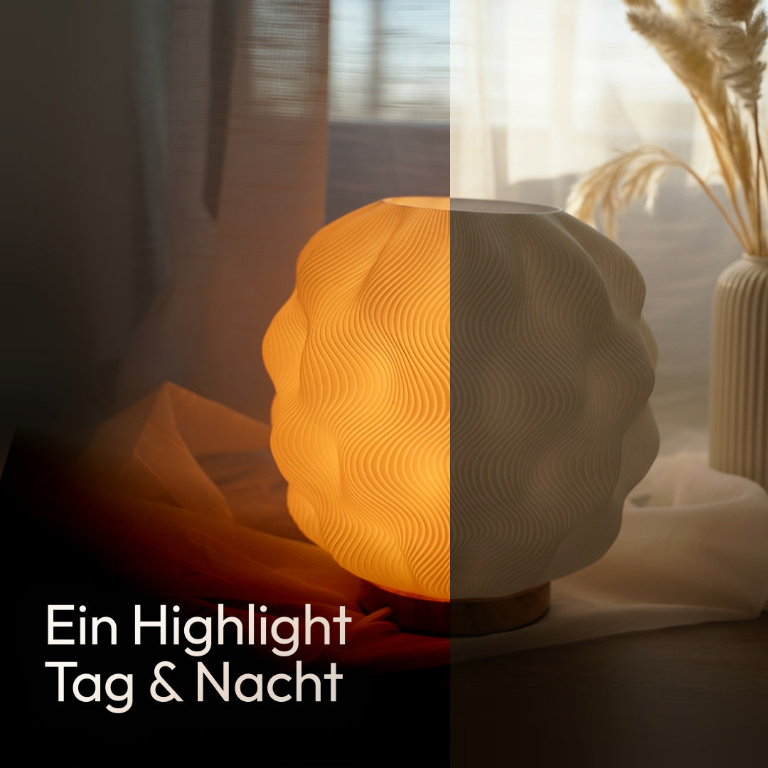 Numo Tischlampe mit orangefarbenem 3D-Schirm, warmes Licht an