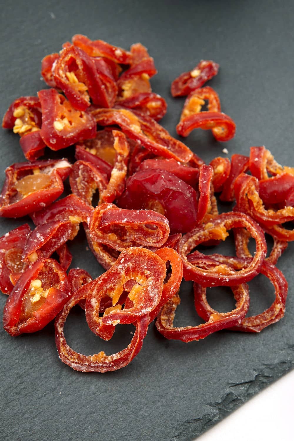 Kandierte Jalapeno-Scheiben, rot-orange, mit Zuckerguss